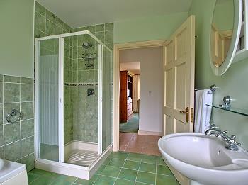 Bathroom with tub and shower