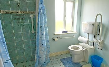 Bathroom with shower and WC, wheel chair friendly
